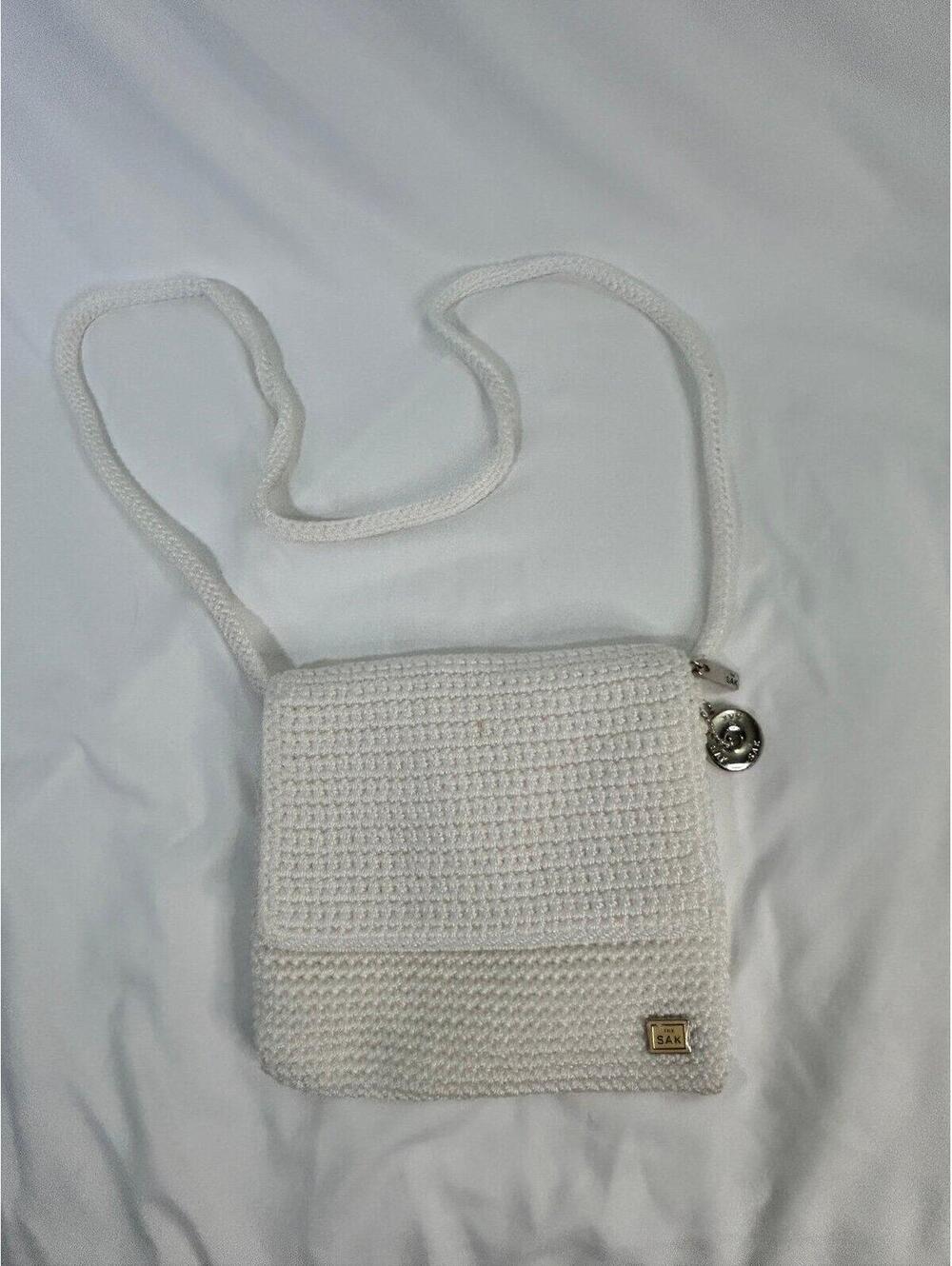 The Sak beige corchet cross body purse handbag